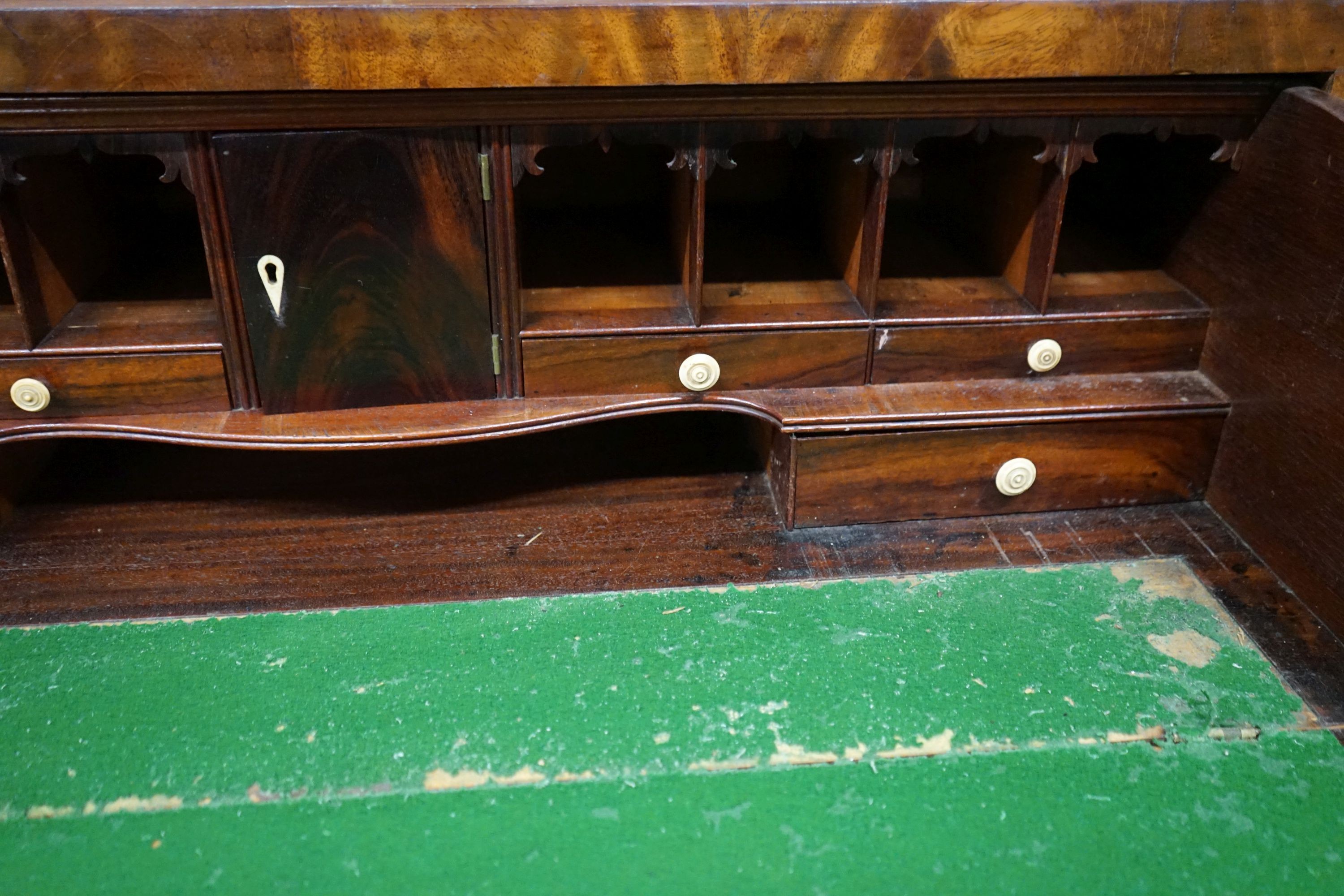 An early 19th century inlaid mahogany secretaire bookcase, length 103cm, depth 53cm, height 221cm